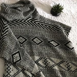 One size fits all sweater poncho
